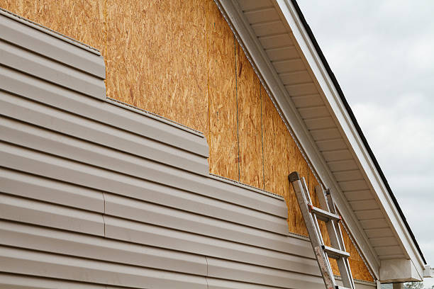 Professional Siding Contractor technician working in National Park, NJ
